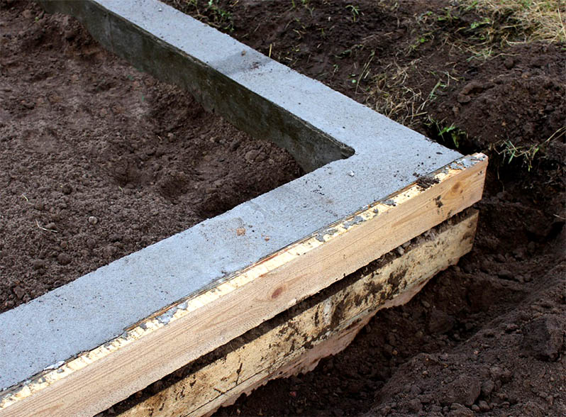digg the soil around the perimeter of the foundation